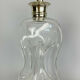 Blown glass carafe with silver frame and cap