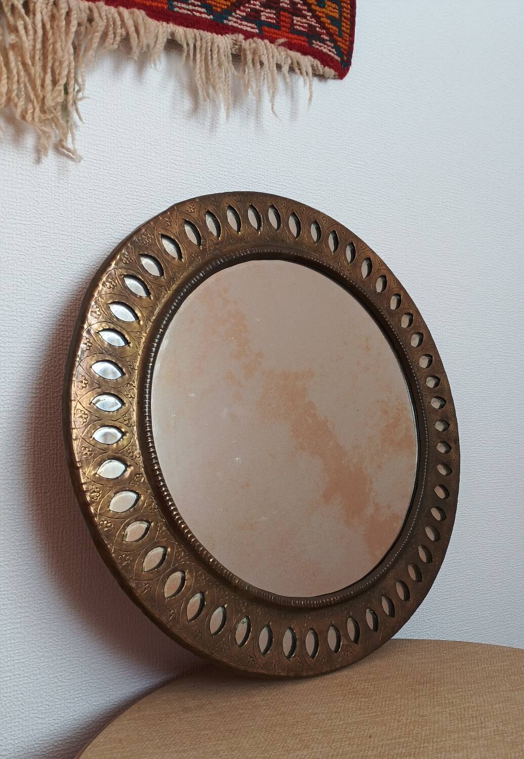 Oriental brass mirror