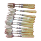 12 Cake forks. Around 1930. Golden metal and yellow Bakelite handle.