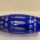 Blue and transparent glass vase, has vintage geometry patterns