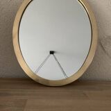 Oval brass mirror