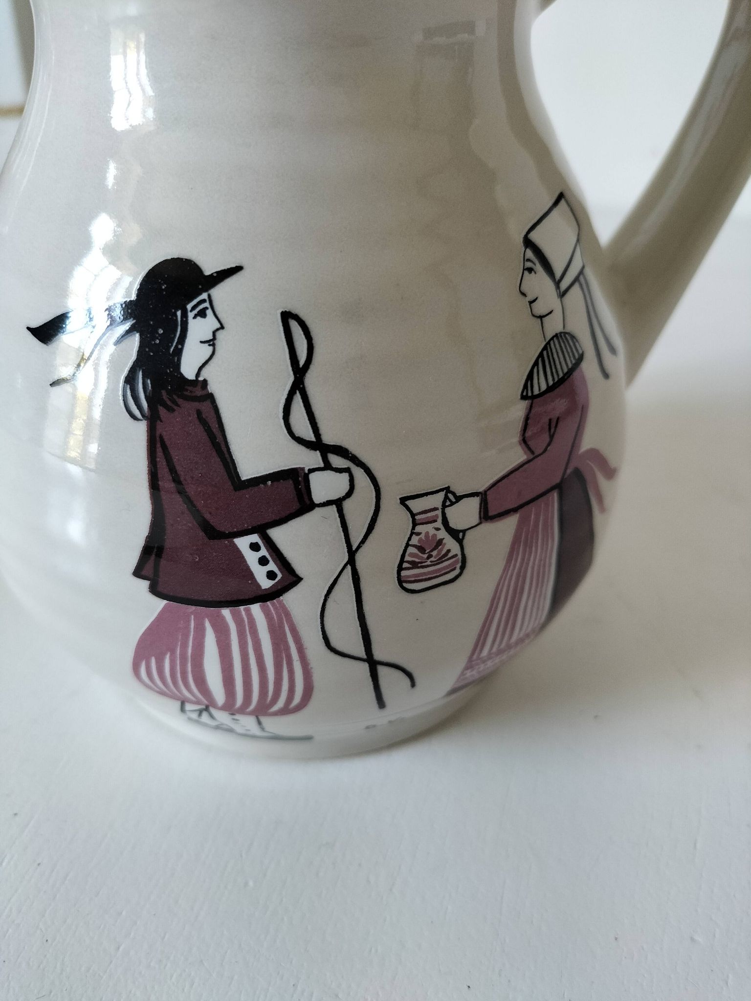 Ceramic pitcher from Quimper, created by Dominique Villard.