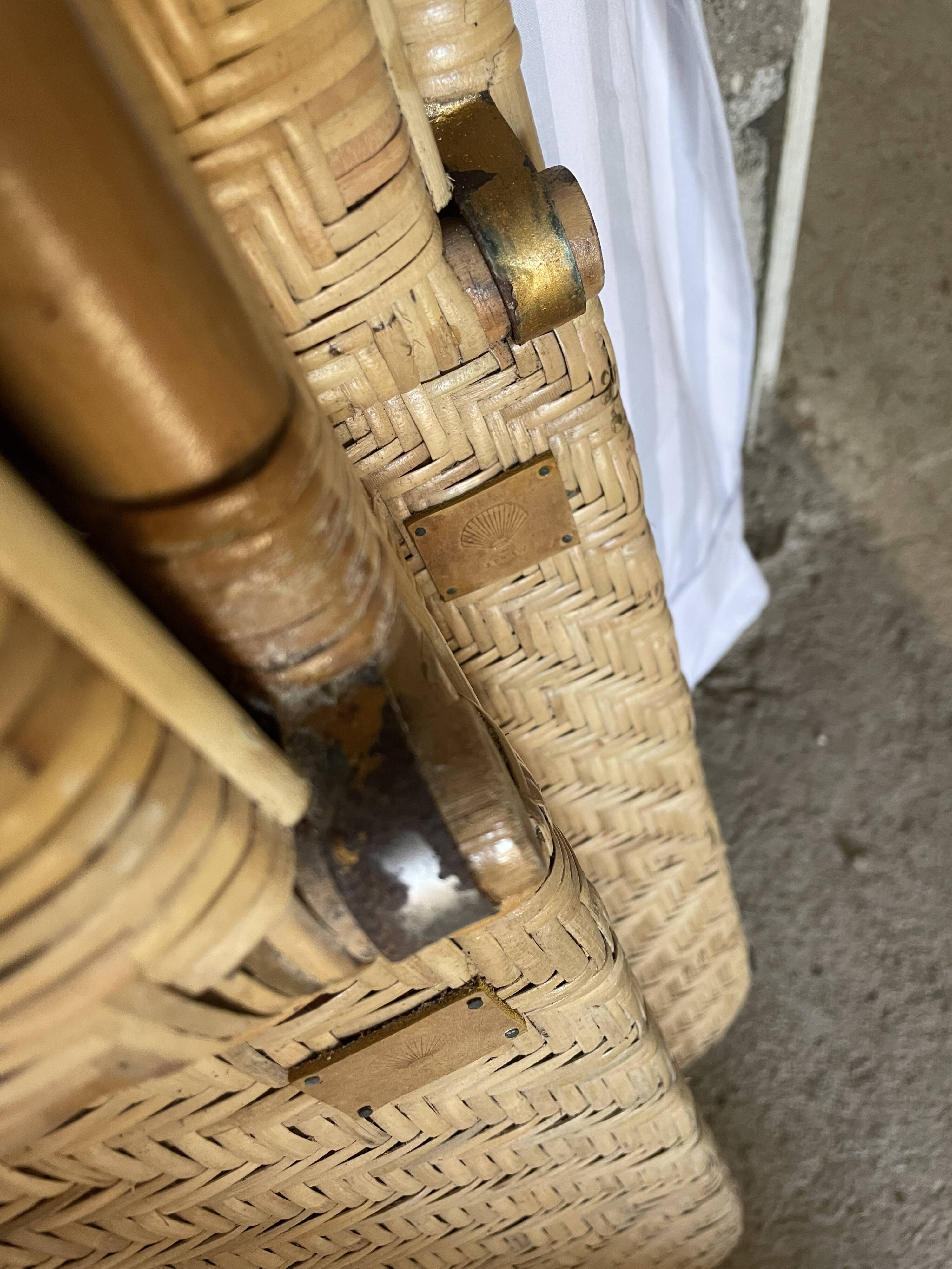 Two rattan garden chairs