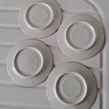 Set of flowered saucer cups