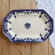 Plat de service ovale terre de fer Longchamp Rouen XIXe