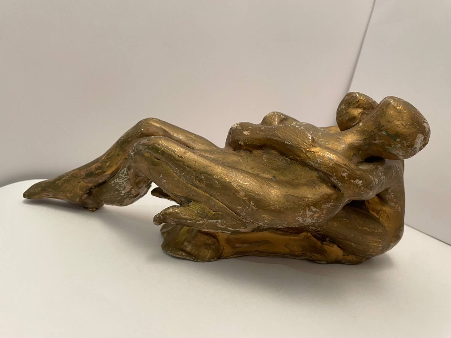 Sculpture of an embracing couple 20th century signed