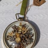 Domed frame of dried flowers