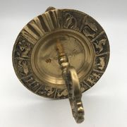 Vintage solid brass ashtray with zodiac sign decor