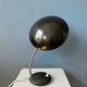 Small black metal desk lamp in Bauhaus style.