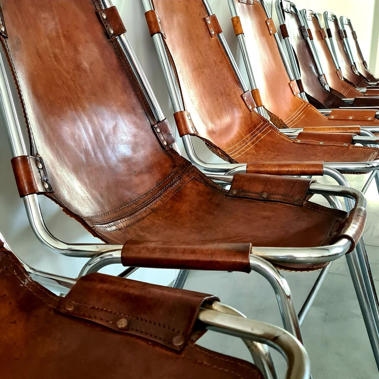 Set of eight mid-century leather dining chairs