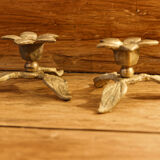 Pair of brass candle holders, flowers