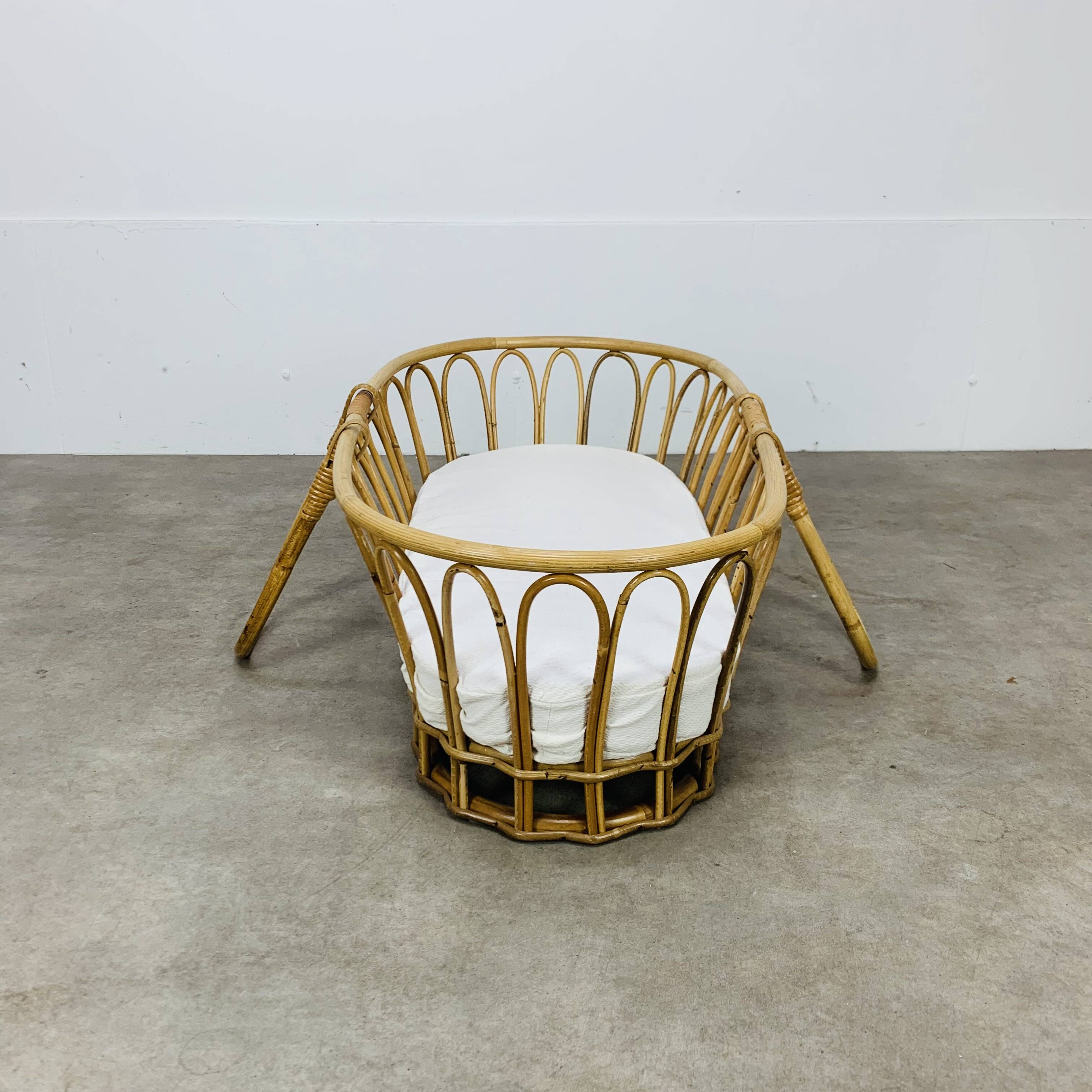 Vintage rattan baby bassinet