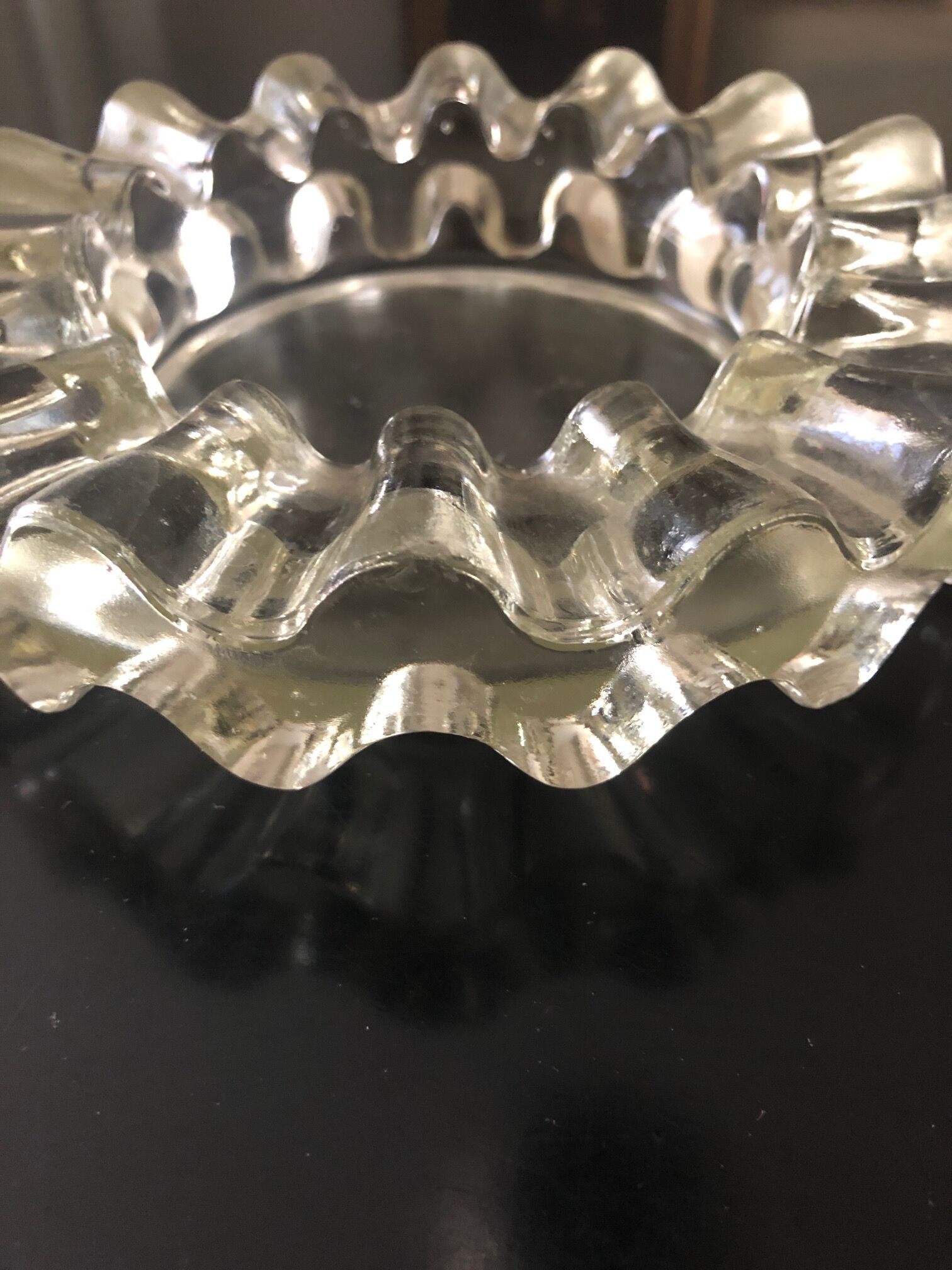 Curved glass ashtray