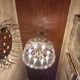 70s designer chandelier with smoked glass plates and gold metal frame