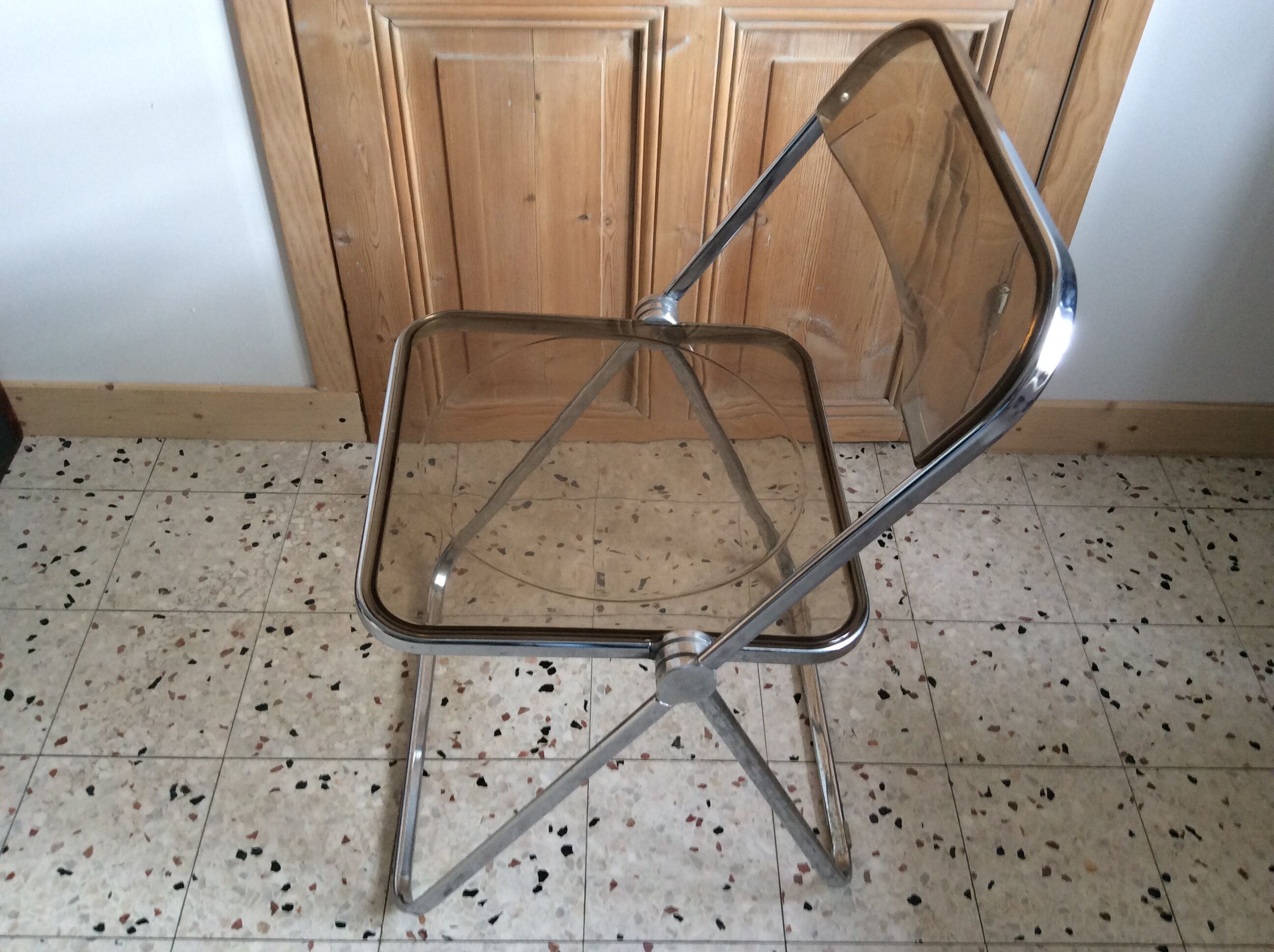 Folded chair by Giancardo Piretti for Castelli