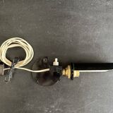 Old black metal and brass wall light, adjustable, 1930s.