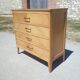 Commode aux pieds compas