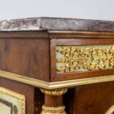 Empire style chest of drawers in lacquer, bronze and marble. Nineteenth century.
