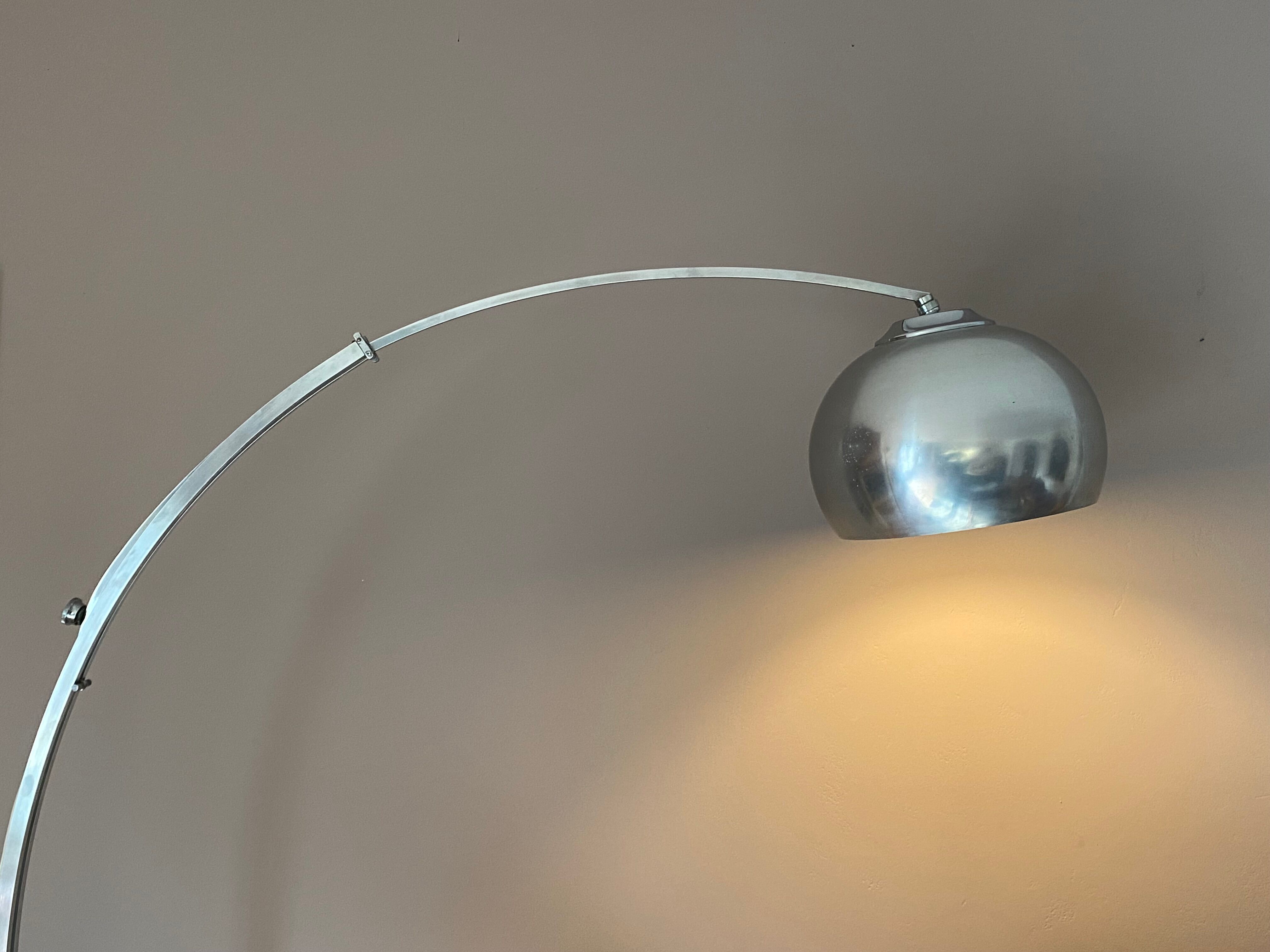 Arch floor lamp. 1970. Italy. Marble foot.