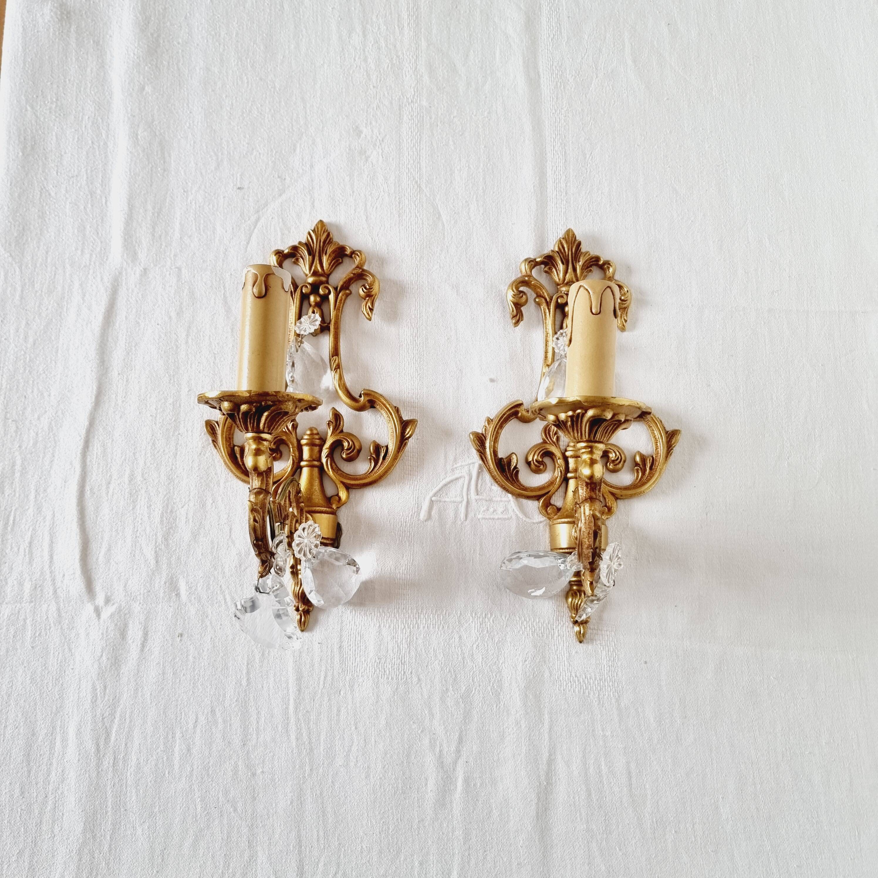 2 antique bronze and rock crystal candles and one light sconces in classic style