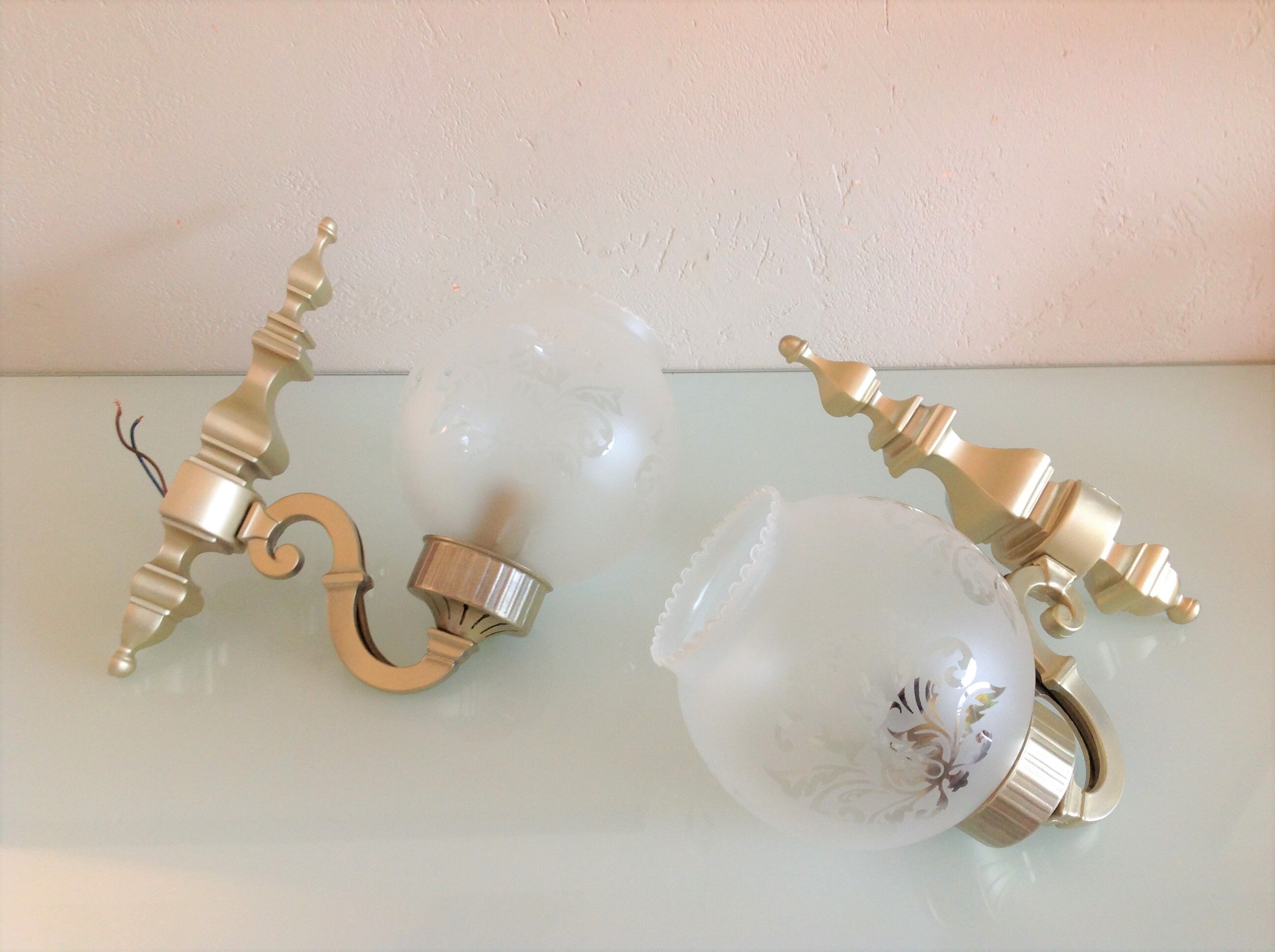 Pair of wall lamps in gilded metal and frosted glass art deco style