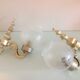 Pair of wall lamps in gilded metal and frosted glass art deco style