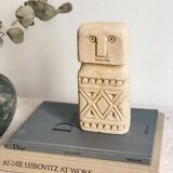 minimalist stone faces