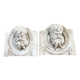 Two moulds; plaster heads