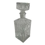 Molded glass carafe, 1960s-1970s, stylized flower decoration, oval, square base, stopper, rosette