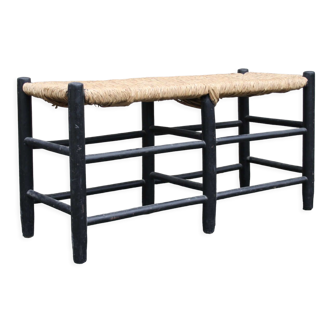 Wooden bench and straw