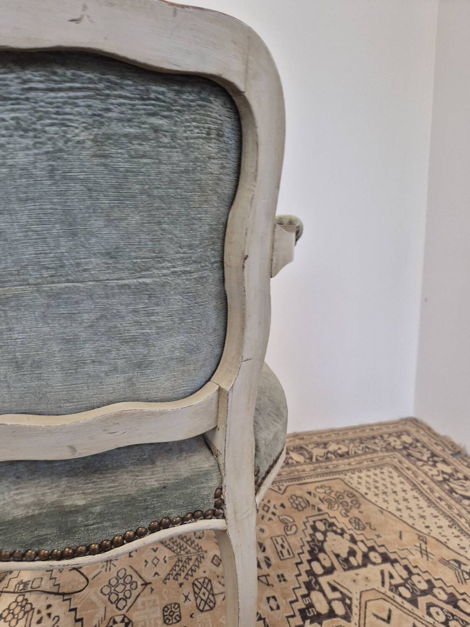 Louis XV style cabriolet armchair in patinated wood and velvet
