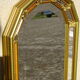 Vertical mirror, gold frame with beading.