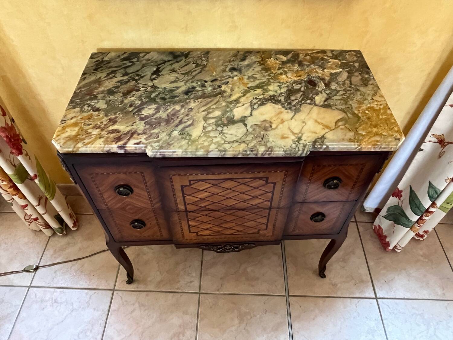 Small piece of furniture with marble top