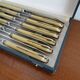 12 Art Deco knives stainless steel and bone 1930 in case