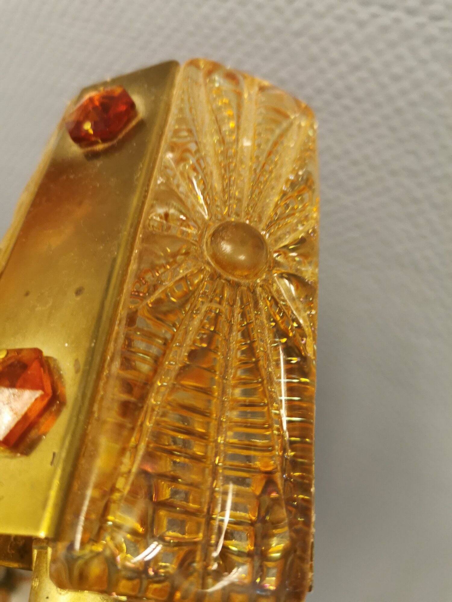 A pair of wall lights with brass-colored suspension with thick pressed glass. Vitrika, Denmark