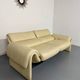 Two-seater designer sofa De Sede DS-2011 in cream leather with adjustable backrest.