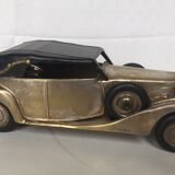 Ancient miniature metal car