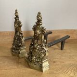 Pair of Louis XV andirons in solid bronze, early 20th century