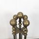 Brass fireplace tool set with four accessories