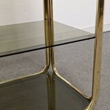 Hollywood Regency gilt metal and smoked glass shelf, Italy circa 1970