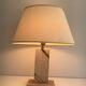 Travertine lamp with brass inlay