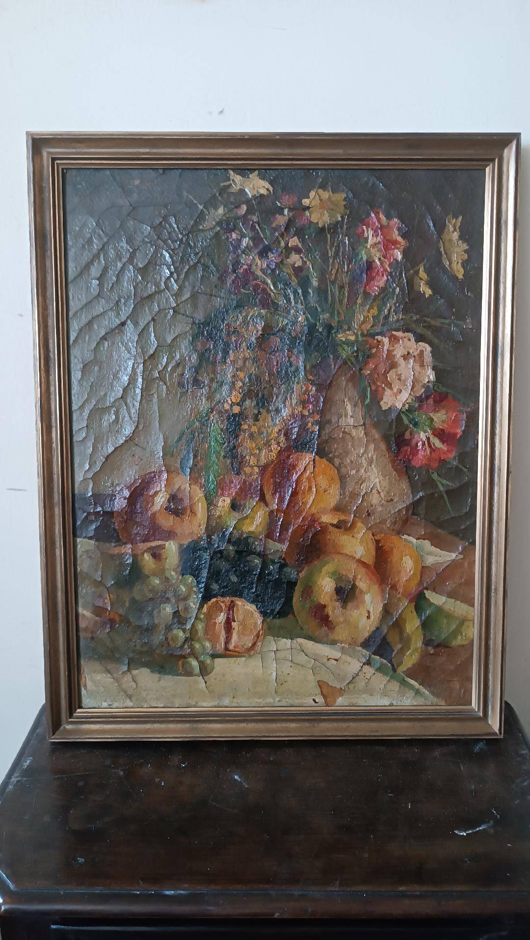 19th century oil painting on canvas depicting a vase of fruit