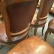 Suite de six chaises en noyer avec assises cuir, style Louis XV
