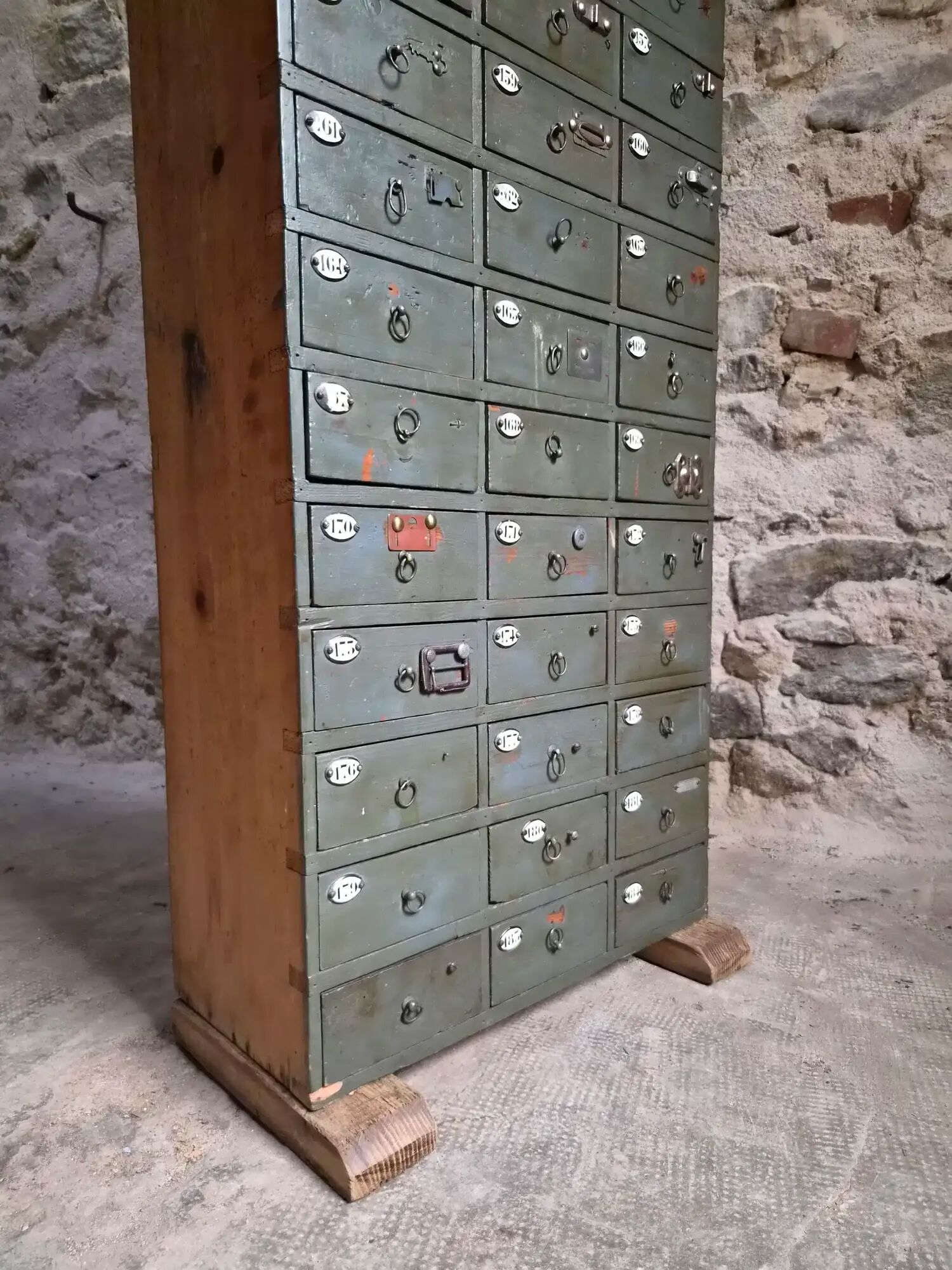 Antique hardware cabinet with 48 drawers, circa 1900.