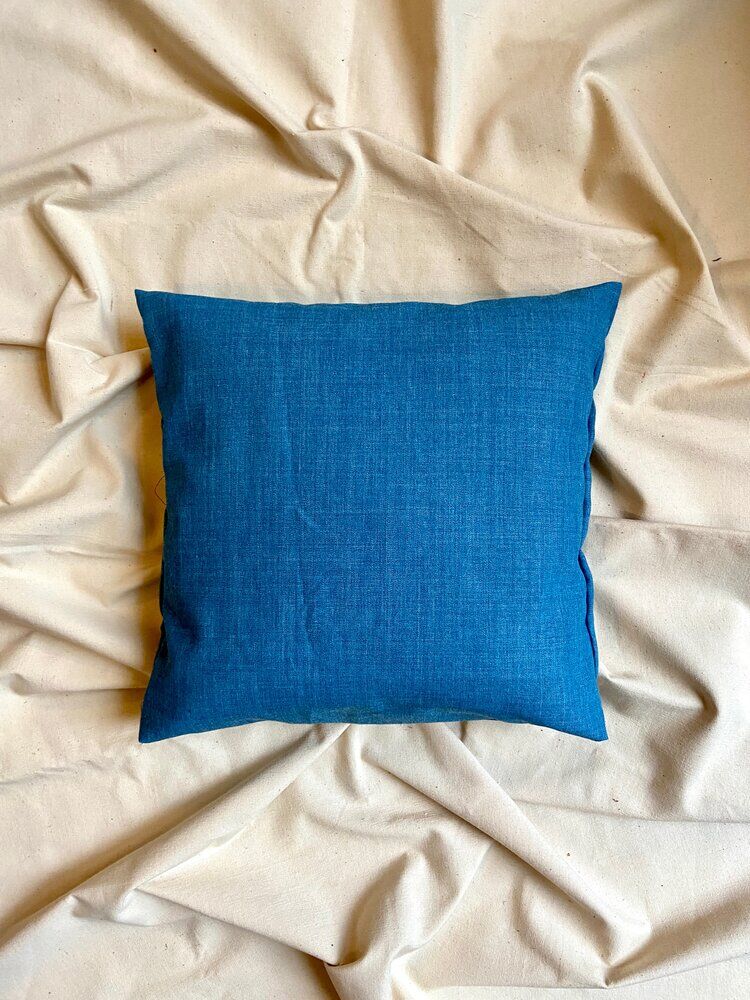 Coussin en coton bleu 40 cm