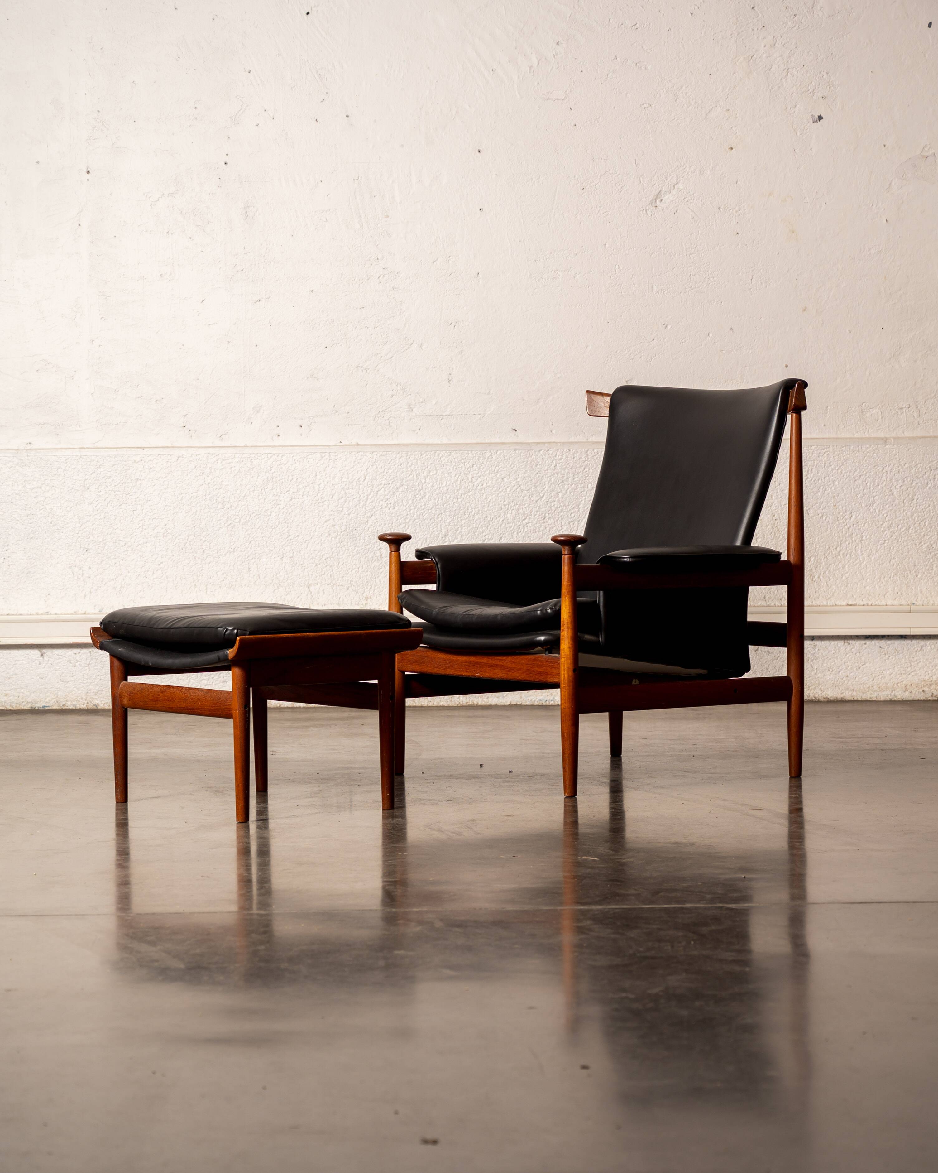 Finished Juhl armchair and its ottoman.