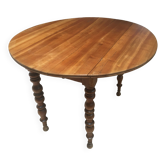 oval walnut dining table with 2 extensions