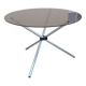 Vintage 70s table with glass and chrome legs.