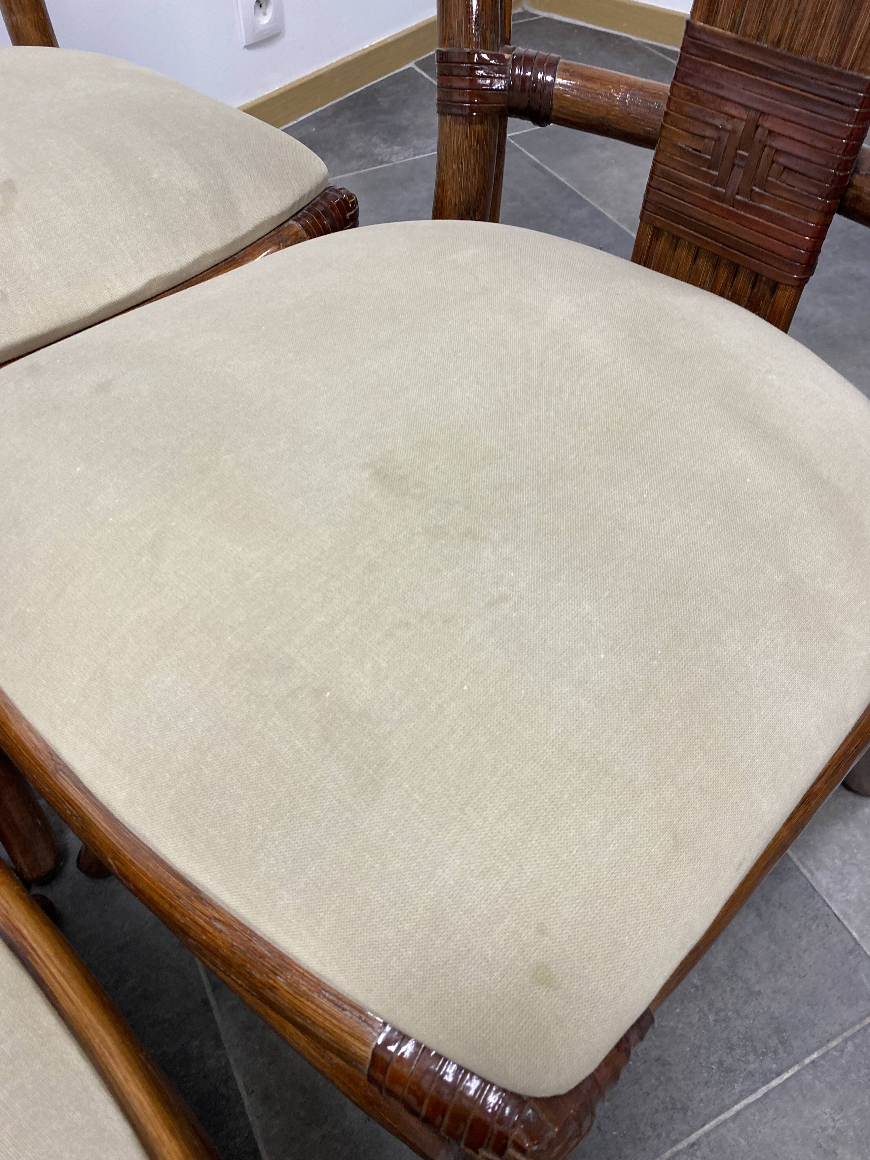 4 vintage woven rattan chairs