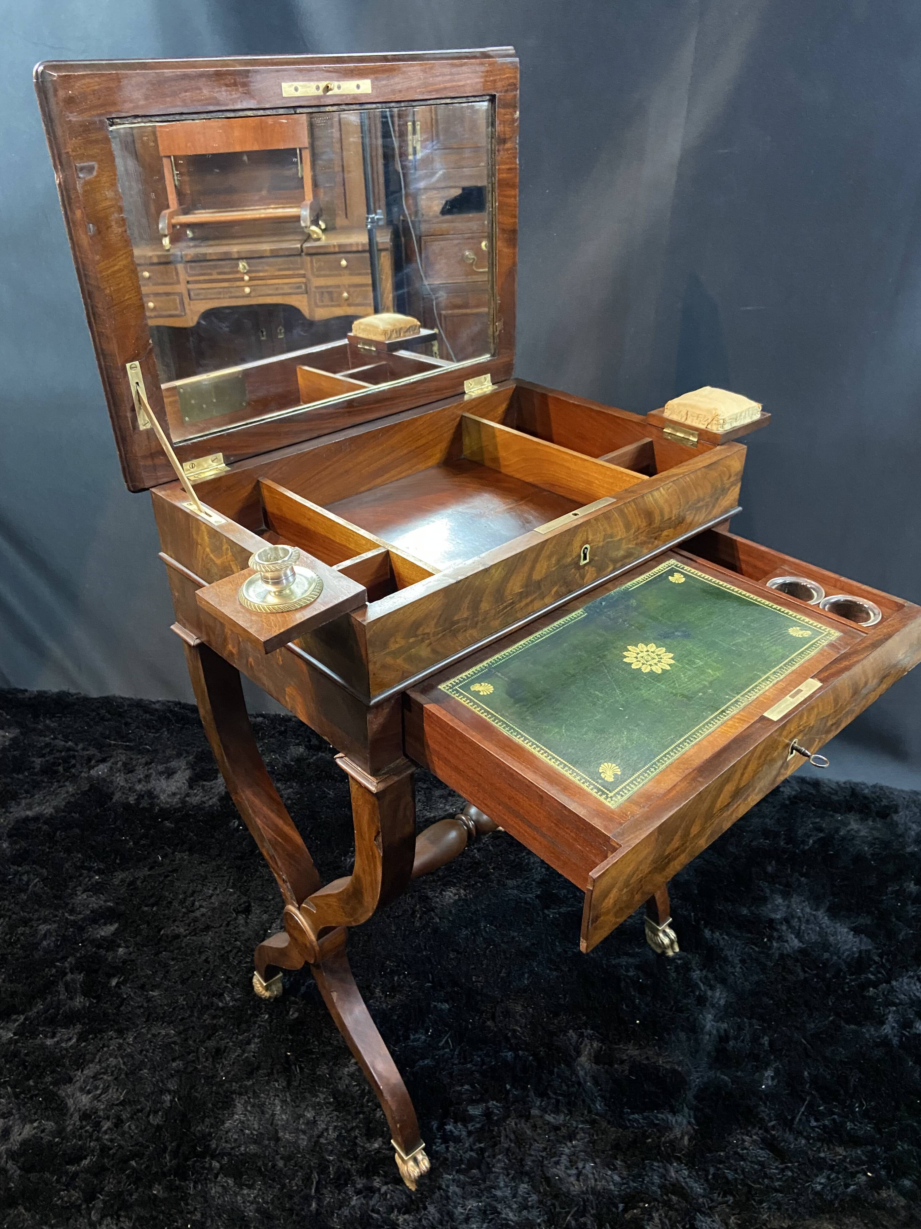 Louis-Philippe period mahogany writing desk with candlestick, 19th century